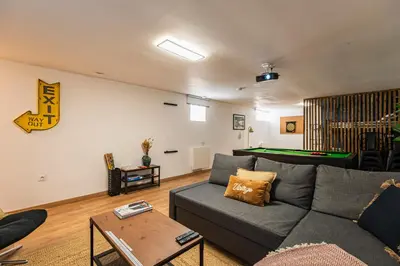 Coin salon dans l'établissement Immeuble spacieux - hyper centre - 15 couchages