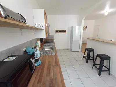 Cuisine ou kitchenette dans l'établissement Appartemple