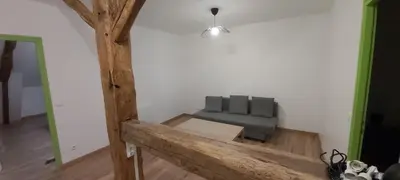 Coin salon dans l'établissement Gîte Betula