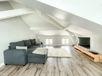 Coin salon dans l'établissement A1 Champagne Loft - 105 m2 6 personnes - Place de la République - Châlons en Champagne