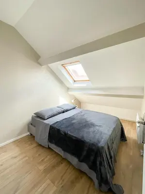 Un ou plusieurs lits dans un hébergement de l'établissement A1 Champagne Loft - 105 m2 6 personnes - Place de la République - Châlons en Champagne