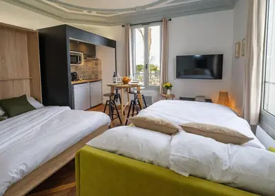 Un ou plusieurs lits dans un hébergement de l'établissement Villa Forestière Studio Le Châtaignier