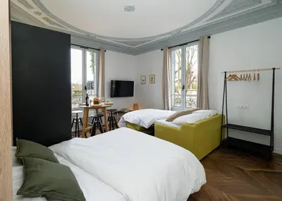 Un ou plusieurs lits dans un hébergement de l'établissement Villa Forestière Studio Le Châtaignier