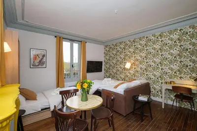 Un ou plusieurs lits dans un hébergement de l'établissement Villa Forestière Studio Le Sophora
