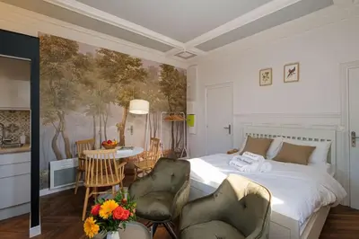 Un ou plusieurs lits dans un hébergement de l'établissement Villa Forestière Studio Le Chêne