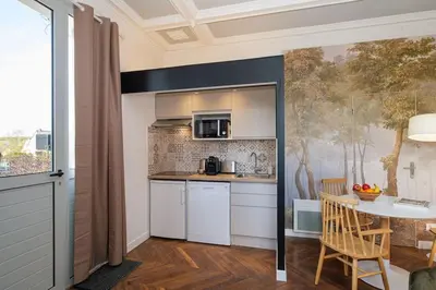 Cuisine ou kitchenette dans l'établissement Villa Forestière Studio Le Chêne