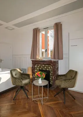 Coin salon dans l'établissement Villa Forestière Studio Le Chêne