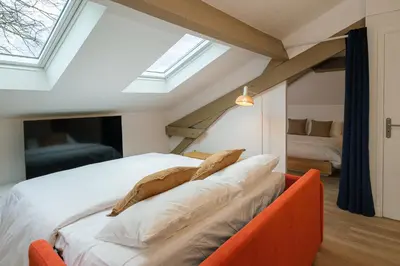 Un ou plusieurs lits dans un hébergement de l'établissement Villa Forestière Appart Le Cèdre